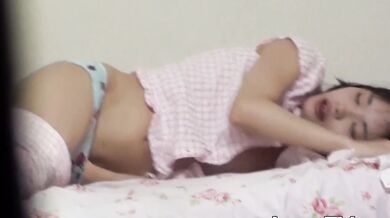 Skinny Japanese woman fingers her bald pussy to orgasm on hidden cam